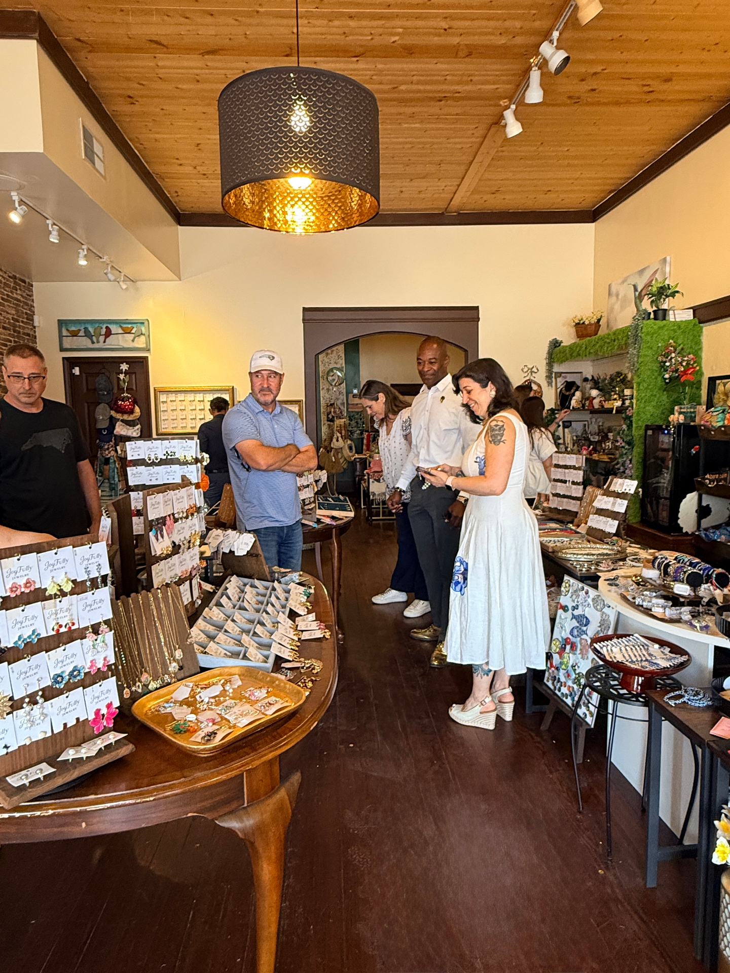 Handcrafted jewelry displays inside Joyfully House